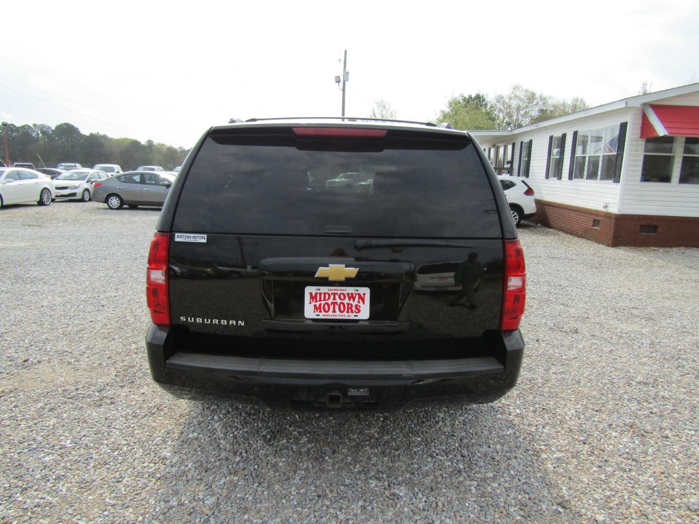 2014 Black /Black Chevrolet Suburban LT 1500 2WD (1GNSCJE00ER) with an 5.3L V8 OHV 16V FFV engine, Automatic transmission, located at 15016 S Hwy 231, Midland City, AL, 36350, (334) 983-3001, 31.306210, -85.495277 - Photo#6